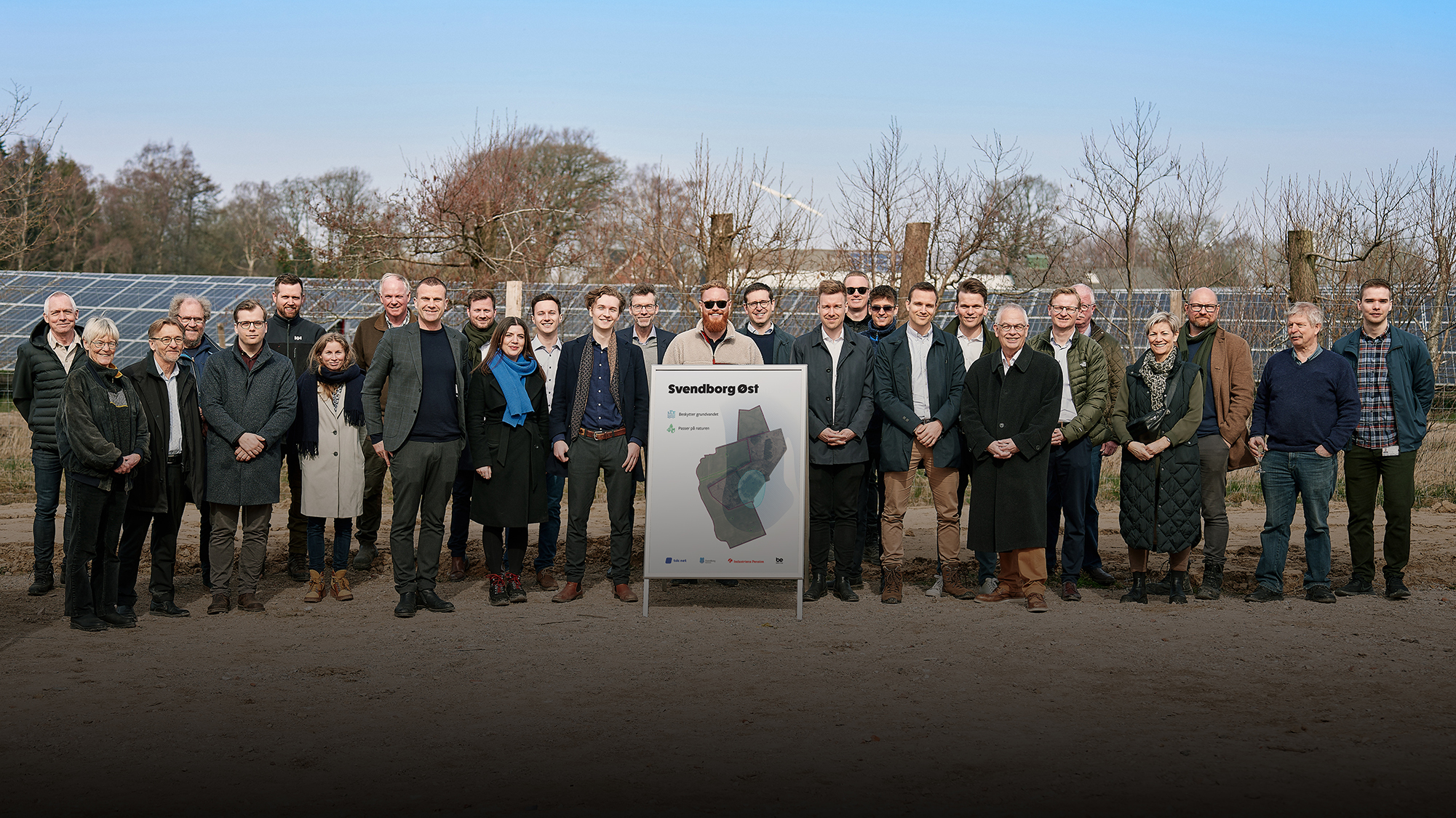 A crowd of people at an opening event of a solar park