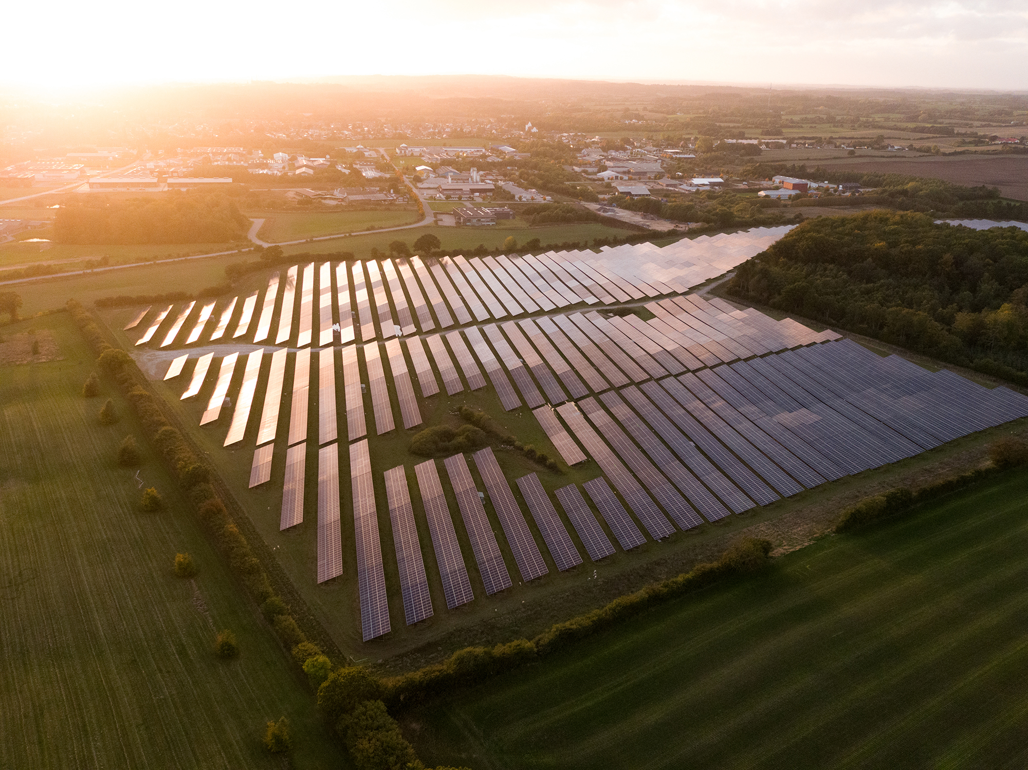 Droneimage of solar park in the morning sun. 