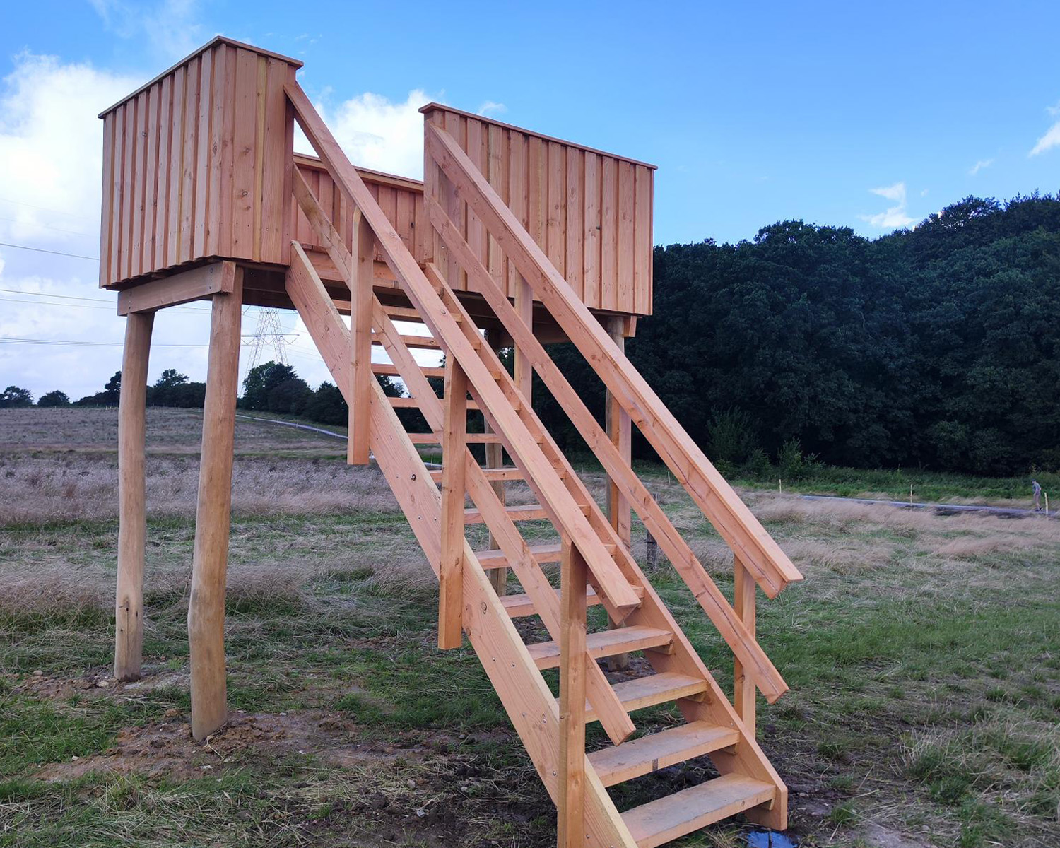 Viewing tower near a path)